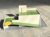 a model of a table tennis court with a yellow ball on it