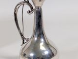 an image of a silver pitcher on a white background