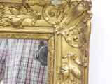 a man that is taking a picture of himself in a mirror
