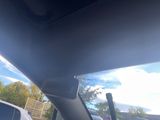 a view of a car from inside of a vehicle