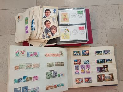 a lot of stamps on a book on the floor