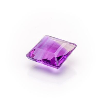 a square purple amethorate stone on a white background