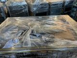 a lot of boxes that are wrapped up in plastic