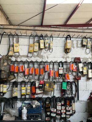 a picture of a garage with a lot of tools hanging on the wall