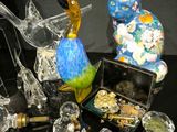 a lot of glass figurines sitting on a table