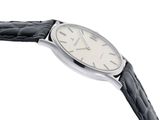 a watch that is sitting on top of a black leather strap