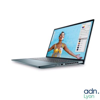 a laptop with a picture of a woman on the screen