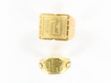 two gold rings with a signet in the middle and a small signet in the middle