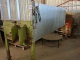 an image of a large metal structure in a warehouse