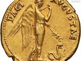 a gold coin with an image of an angel on it