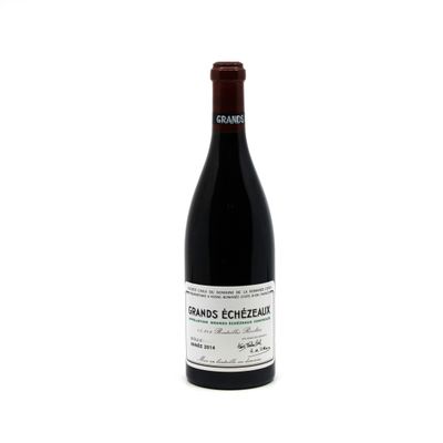 a bottle of wine that is sitting on a table