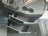 an image of a car dashboard with a cup holder