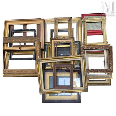 a lot of picture frames that are stacked together