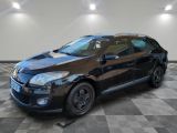 a picture of a black car parked in a garage