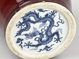 chinese blue and white vase with dragon design on the lid