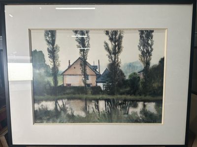 framed painting of a house by a lake with trees in the background