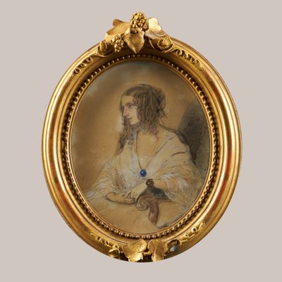 tableau représentant un homme tenant un oiseau dans la main, dans un cadre doré