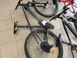 several bikes are lined up in a row in a store
