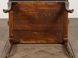 a wooden table with a magazine rack on top of it