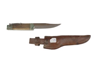 two knives with leather sheaths on a white background