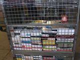 a metal cart with a lot of books on top of it