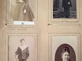 four old black and white photos of a man, woman, and child
