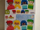 two boxes of lego duplies with different designs on them