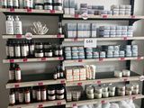 a shelf with many different products on it in a store