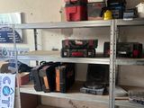 a shelf with tools on it in a garage