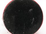 an image of a black and red ring with a red band