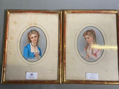 two framed pictures of a woman and a child in a gold frame