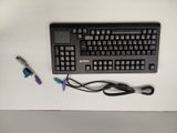 a keyboard and a mouse sitting on a table