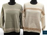 two women ' s sweaters on mannequin mannequin mannequin mannequin mannequin mannequin mannequin mannequin mann