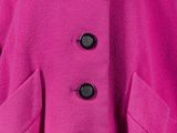 a close up of a pink coat on a mannequin mannequin mannequin mannequin mannequin mannequin mannequin manne