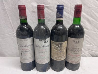 four bottles of wine are lined up on a table