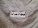a close up of a label on a fur coat