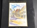 an image of a book with a picture of a street in the background