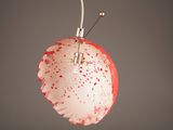 a red and white lamp hanging from the ceiling
