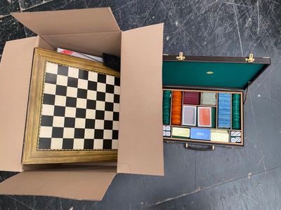 a box with a checkerboard and a box with a picture inside of it