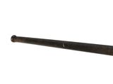 a baseball bat that is sitting on a white surface