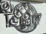 a black and white drawing of a plate of food on a table