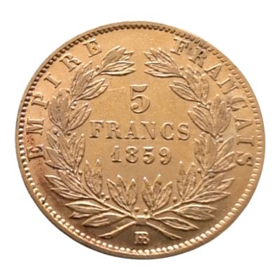 une image représentant une pièce d'or ornée d'une couronne de feuilles