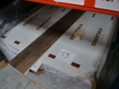 a stack of boxes that have been wrapped in plastic