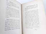 an open book with a black and white picture on it