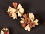 three different types of decorative objects on a black surface
