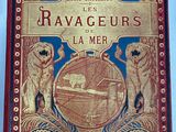 an old book with illustrations of dogs and cats on it