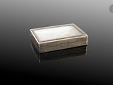 an image of a box with a mother of pearl in it on a black surface