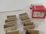 a box of empty boxes sitting on a table next to a box of empty boxes