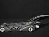 a toy car with a batman logo on it