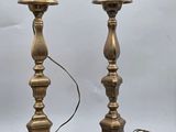 pair of antique brass candlesticks with turned bases